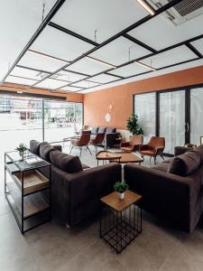 Area soggiorno di Clay Hotel Udonthani