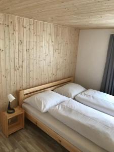 Postel nebo postele na pokoji v ubytování Apartmány Michaela