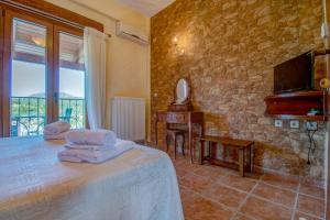 Posteľ alebo postele v izbe v ubytovaní Corfu Sokraki Villas