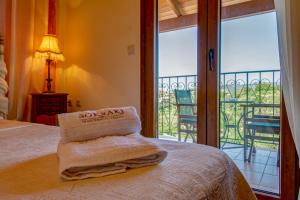 Posteľ alebo postele v izbe v ubytovaní Corfu Sokraki Villas