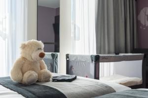 Postel nebo postele na pokoji v ubytování Le Merceny Motel