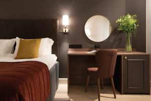 Postel nebo postele na pokoji v ubytování Elite Stora Hotellet Örebro