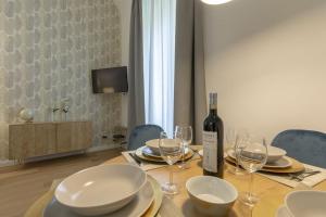 Televízia a/alebo spoločenská miestnosť v ubytovaní FLORENCE FIORINO APARTMENT