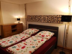 Postel nebo postele na pokoji v ubytování Waldwipfel-Appartement