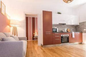 A kitchen or kitchenette at JOIVY Bright Apartment for 4 next to City Life