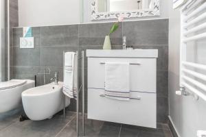 A bathroom at JOIVY Bright Apartment for 4 next to City Life