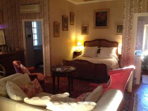 Ένα ή περισσότερα κρεβάτια σε δωμάτιο στο B&B Domaine Le Clos du Pavillon "Authenticité et Ressourcement garantis"
