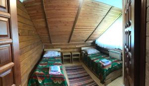 Postel nebo postele na pokoji v ubytování KATERINA