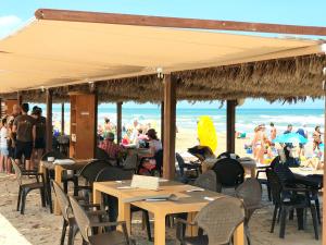 Hostia v ubytovaní Apartamento con piscina en Oliva Nova