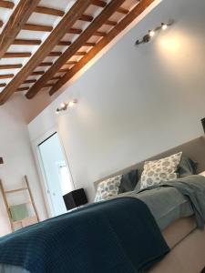 Łóżko lub łóżka w pokoju w obiekcie Il Posto Perfetto