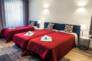 Ένα ή περισσότερα κρεβάτια σε δωμάτιο στο In Barcelos Hostel & Guest House