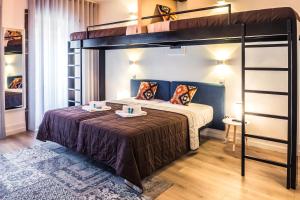 Ένα ή περισσότερα κρεβάτια σε δωμάτιο στο In Barcelos Hostel & Guest House