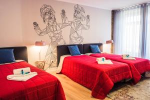 Ένα ή περισσότερα κρεβάτια σε δωμάτιο στο In Barcelos Hostel & Guest House