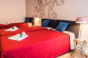 Ένα ή περισσότερα κρεβάτια σε δωμάτιο στο In Barcelos Hostel & Guest House