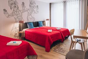 Ένα ή περισσότερα κρεβάτια σε δωμάτιο στο In Barcelos Hostel & Guest House