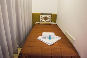 Ένα ή περισσότερα κρεβάτια σε δωμάτιο στο In Barcelos Hostel & Guest House