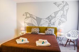 Ένα ή περισσότερα κρεβάτια σε δωμάτιο στο In Barcelos Hostel & Guest House