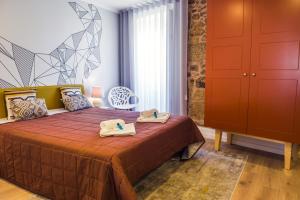 Ένα ή περισσότερα κρεβάτια σε δωμάτιο στο In Barcelos Hostel & Guest House
