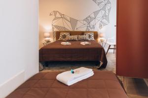 Ένα ή περισσότερα κρεβάτια σε δωμάτιο στο In Barcelos Hostel & Guest House