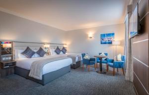 Postel nebo postele na pokoji v ubytování Marine Hotel + 19 fotografií
