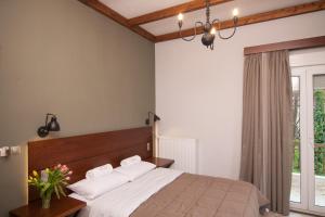 Postelja oz. postelje v sobi nastanitve Hotel Steni