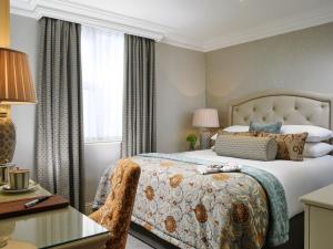 Ένα ή περισσότερα κρεβάτια σε δωμάτιο στο Imperial Hotel Cork City