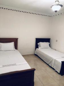 Кровать или кровати в номере Dar Soufiane