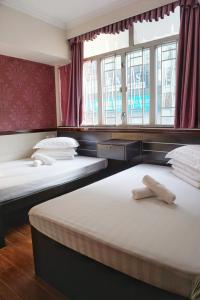 Postel nebo postele na pokoji v ubytování Hang Ho Hostel
