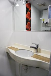 Baðherbergi á Hang Ho Hostel