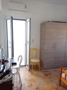 Fotografie z fotogalerie ubytování Grandma Vasiliki Rooms To Let v destinaci Ios