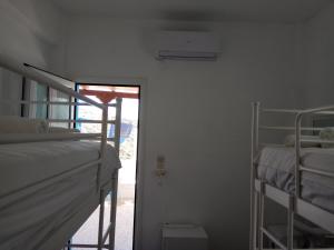 Postel nebo postele na pokoji v ubytování Grandma Vasiliki Rooms To Let