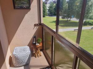 Vonkajšia záhrada v ubytovaní Apartman Orlie Pierko - Tatranska Lomnica