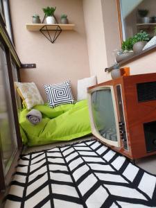 Televízia a/alebo spoločenská miestnosť v ubytovaní Apartman Orlie Pierko - Tatranska Lomnica
