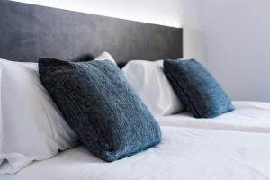 Posteľ alebo postele v izbe v ubytovaní Hostal Ribas