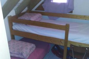 เตียงสองชั้นในห้องที่ Appartement pied des pistes 6/8 pers en Ariège