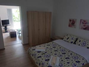 Postel nebo postele na pokoji v ubytování Villa Lana