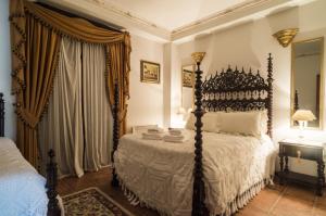 Postel nebo postele na pokoji v ubytování Casa dos Valentes