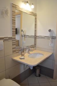 Koupelna v ubytování Guest Rooms Affittacamere