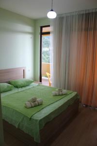 Postel nebo postele na pokoji v ubytování Guesthouse Maria