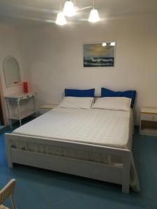Ліжко або ліжка в номері Stella di Mare