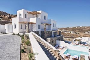 a view of a villa with a swimming pool at Katikies Villas Mykonos in Elia Beach