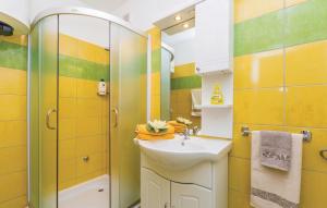 a bathroom with a sink and a shower at E&M in Senj +69 photos