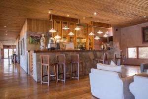 Ο χώρος του lounge ή του μπαρ στο Hotel Cumbres San Pedro de Atacama