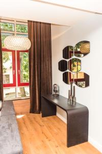 TV a/nebo společenská místnost v ubytování Luxus Stadthaus am Dom
