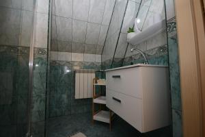 Vonios kambarys apgyvendinimo įstaigoje Apartament Folk&Dream Harenda Zakopane