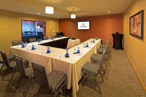 a meeting room with a long table and chairs at Silver Cloud Hotel - Seattle Stadium in Seattle +37 photos