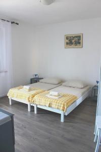 Katil atau katil-katil dalam bilik di Apartments Markov Murter