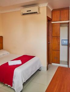 Voodi või voodid majutusasutuse Hotel Murali - Cerca del Aeropuerto de Guayaquil toas