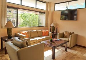 TV a/nebo společenská místnost v ubytování Hotel Murali - Cerca del Aeropuerto de Guayaquil