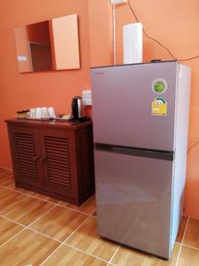 Kuchyň nebo kuchyňský kout v ubytování Chanakarn Guesthouse Sangkhla Buri